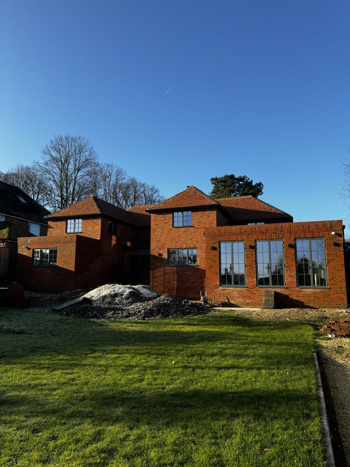 The two-storey rear extensions under construction
