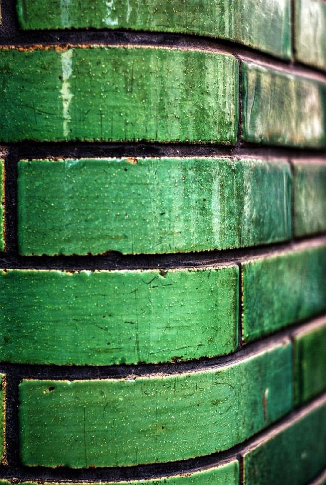 Close view of the green glazed brickwork