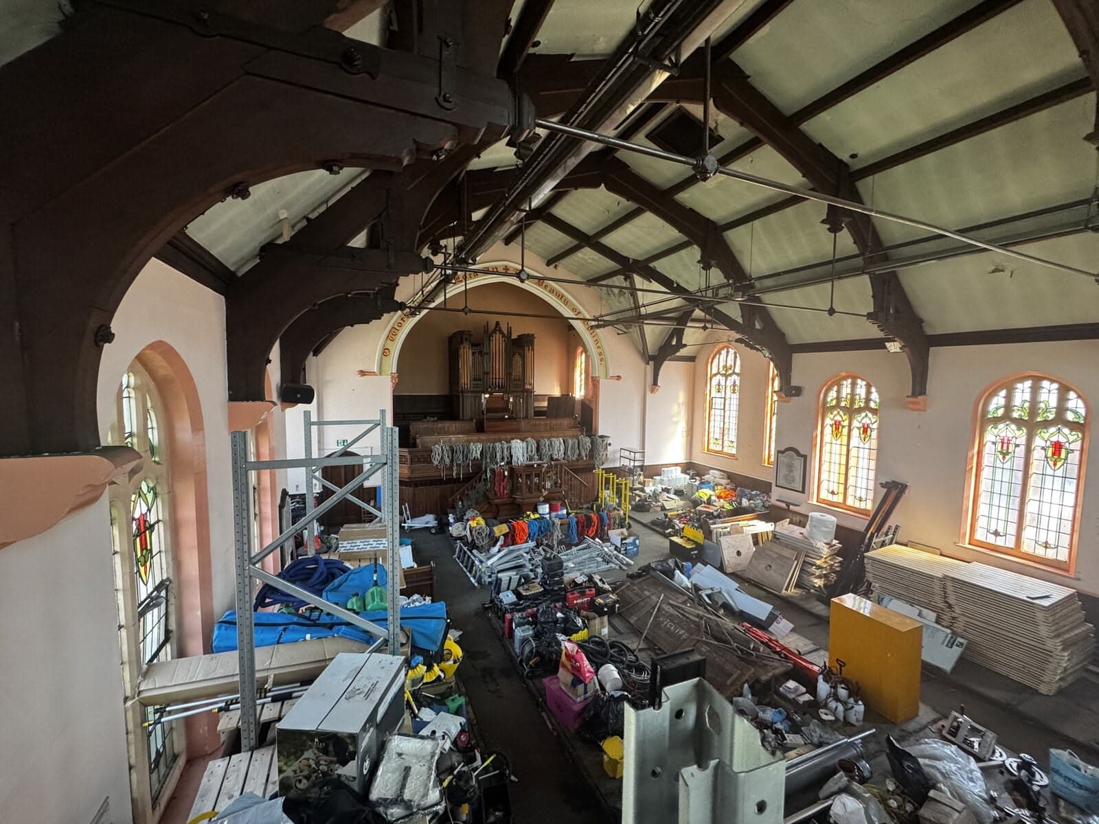 The gallery level looking across the nave to the arched windows