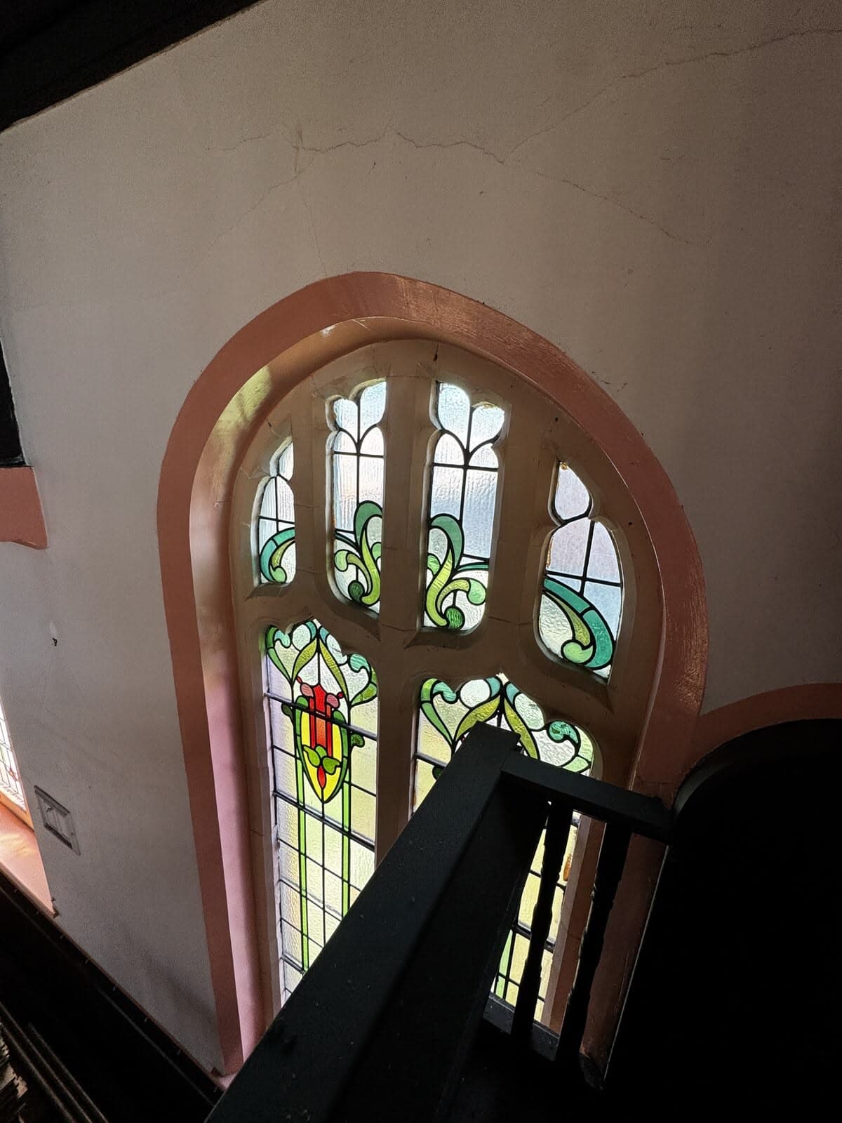 One of the original stained-glass windows retained in the scheme